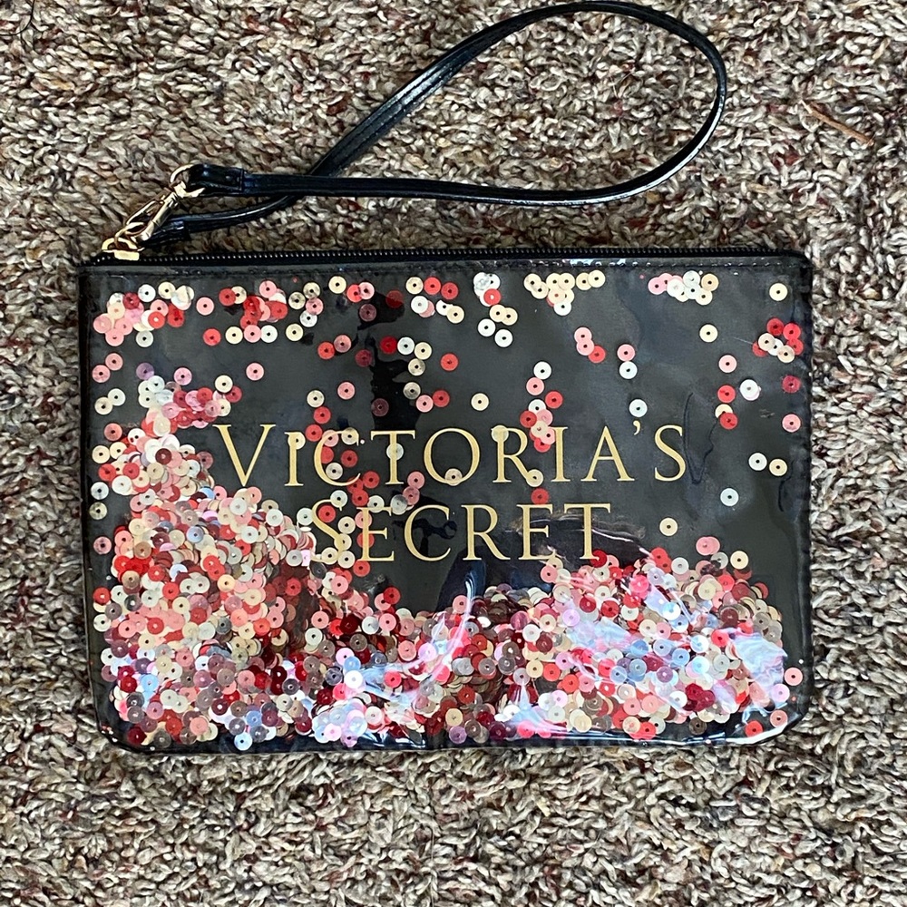 ❤️ NWT Victorias Secret floating sequin wristlet clutch cosmetic or jewelry bag.